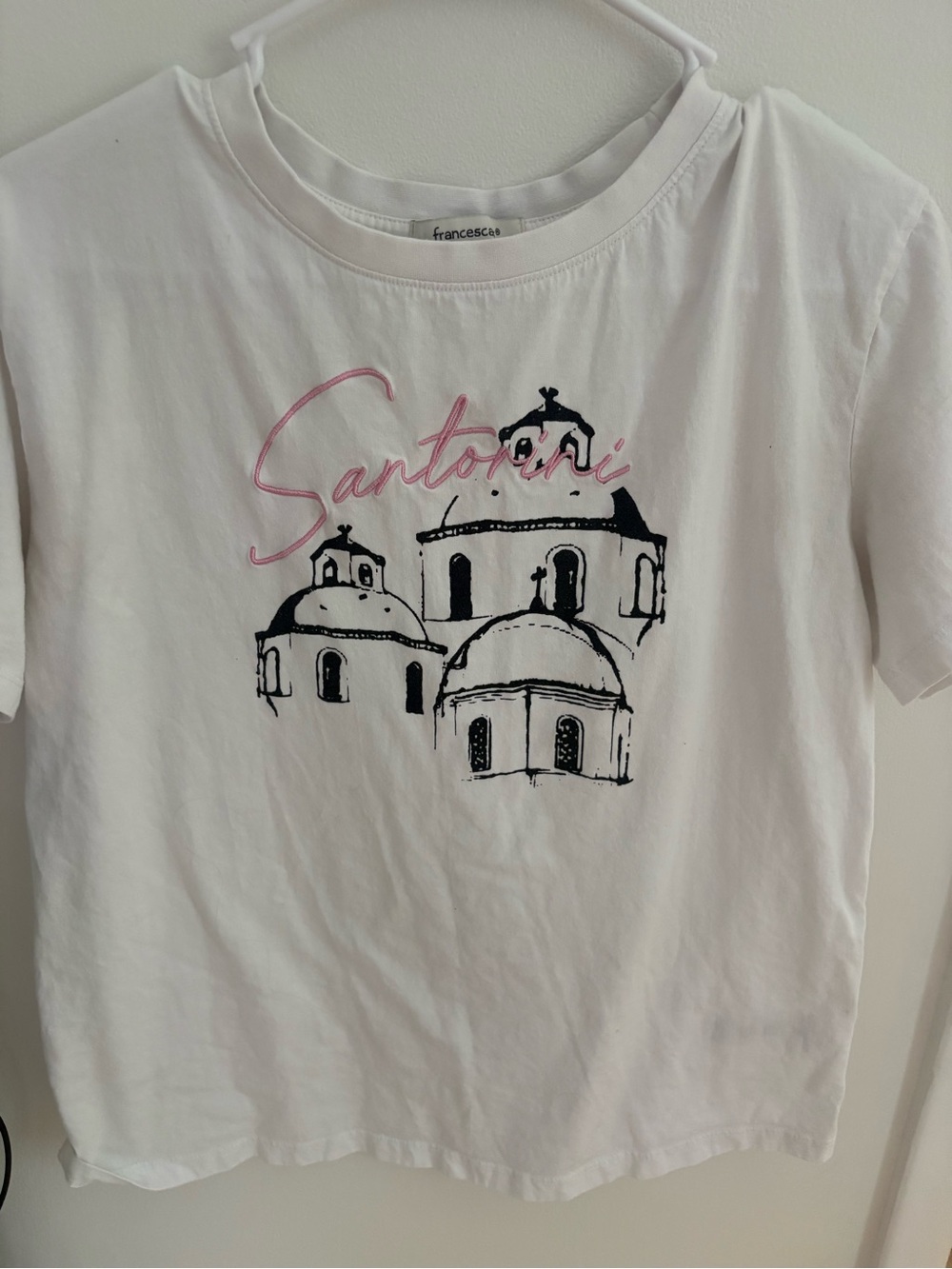 Francesca's Collections White Tee with Pink 'Santorini' Script and Black Sketch